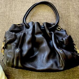 Cole Haan handbag with dust bag.